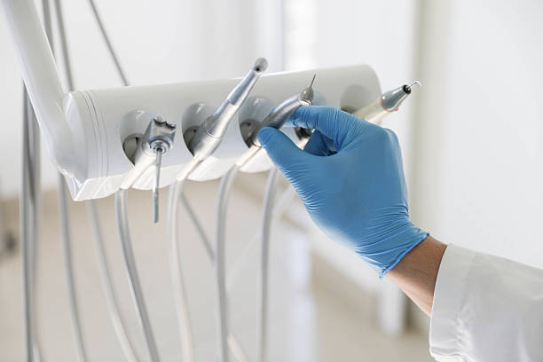 Professional Root Canal Treatment technician working in Taylorville, IL